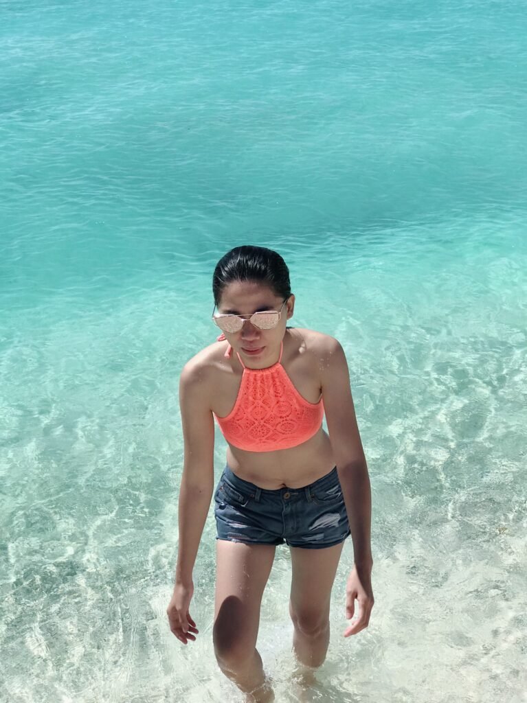 Clear turquoise water surrounding Sumilon Island in Oslob