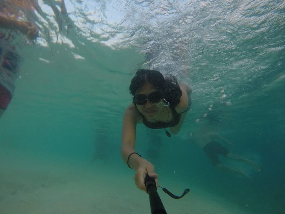 Swimming in the clear blue water of Kalanggaman Island Leyte